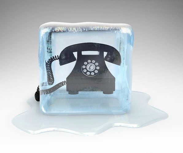 frozen phone representing cold calls of remote tech support scams