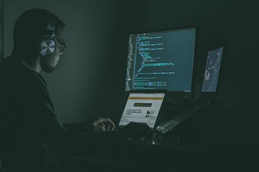 Man-coding-or-hacking-computer
